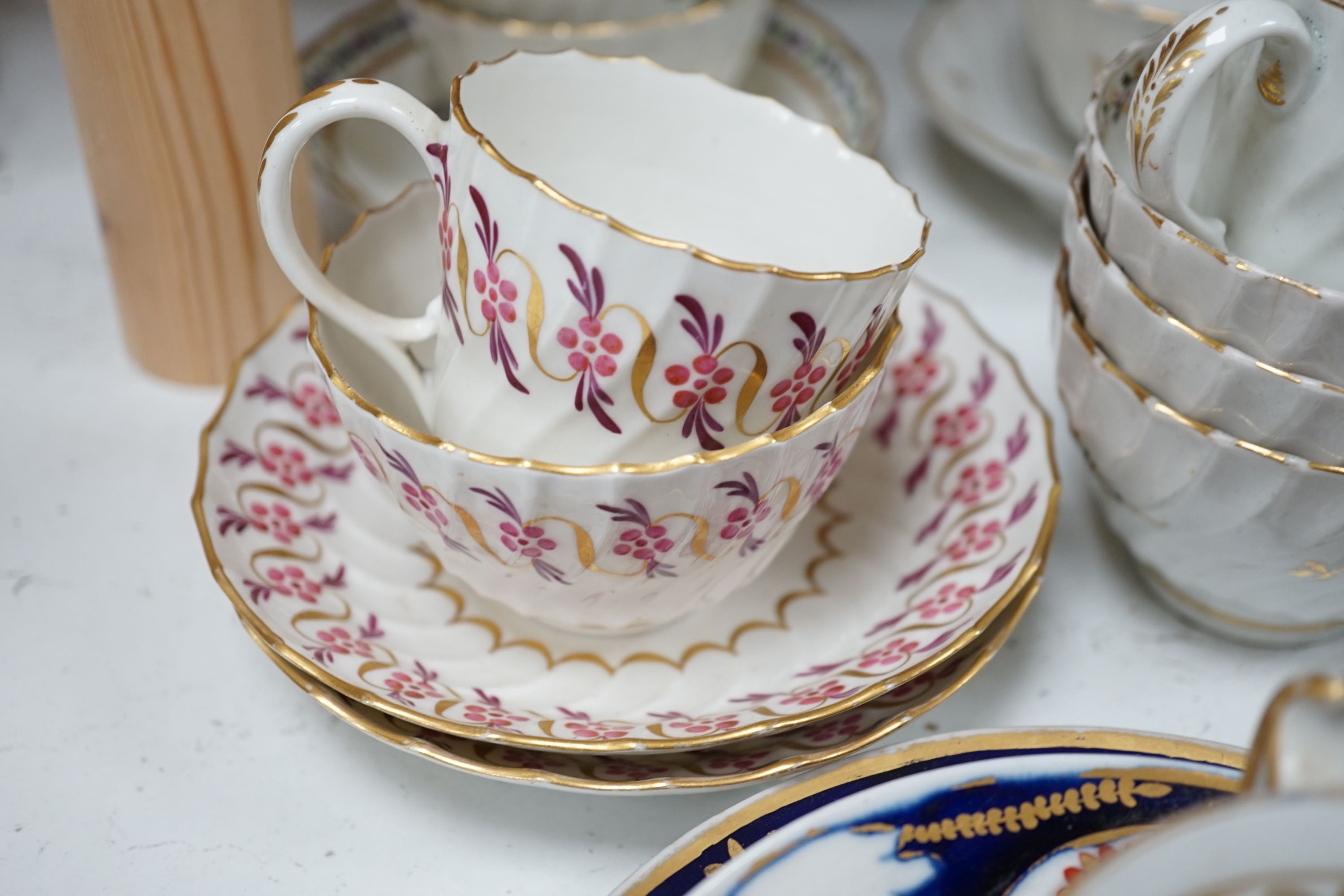 A selection of late 18th/early 19th century English porcelain tea and coffee wares including Worcester and New Hall types